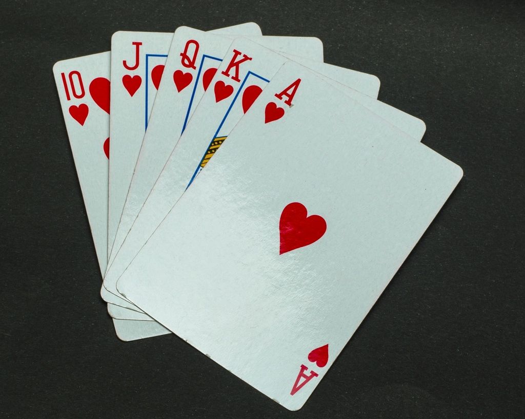 Gaming chips and cards on the table felt